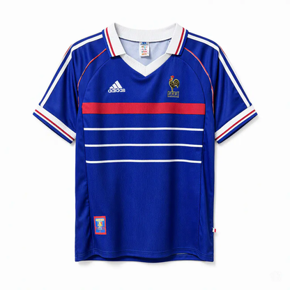 Maillot rétro Équipe de France domicile 1998-1999 adidas, bleu royal avec bande rouge sur la poitrine, vue de face