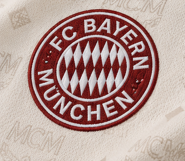 Maillot Bayern Munich co-branded beige 2026/27 - crest
